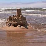 2 B incoming tide and sandcastle